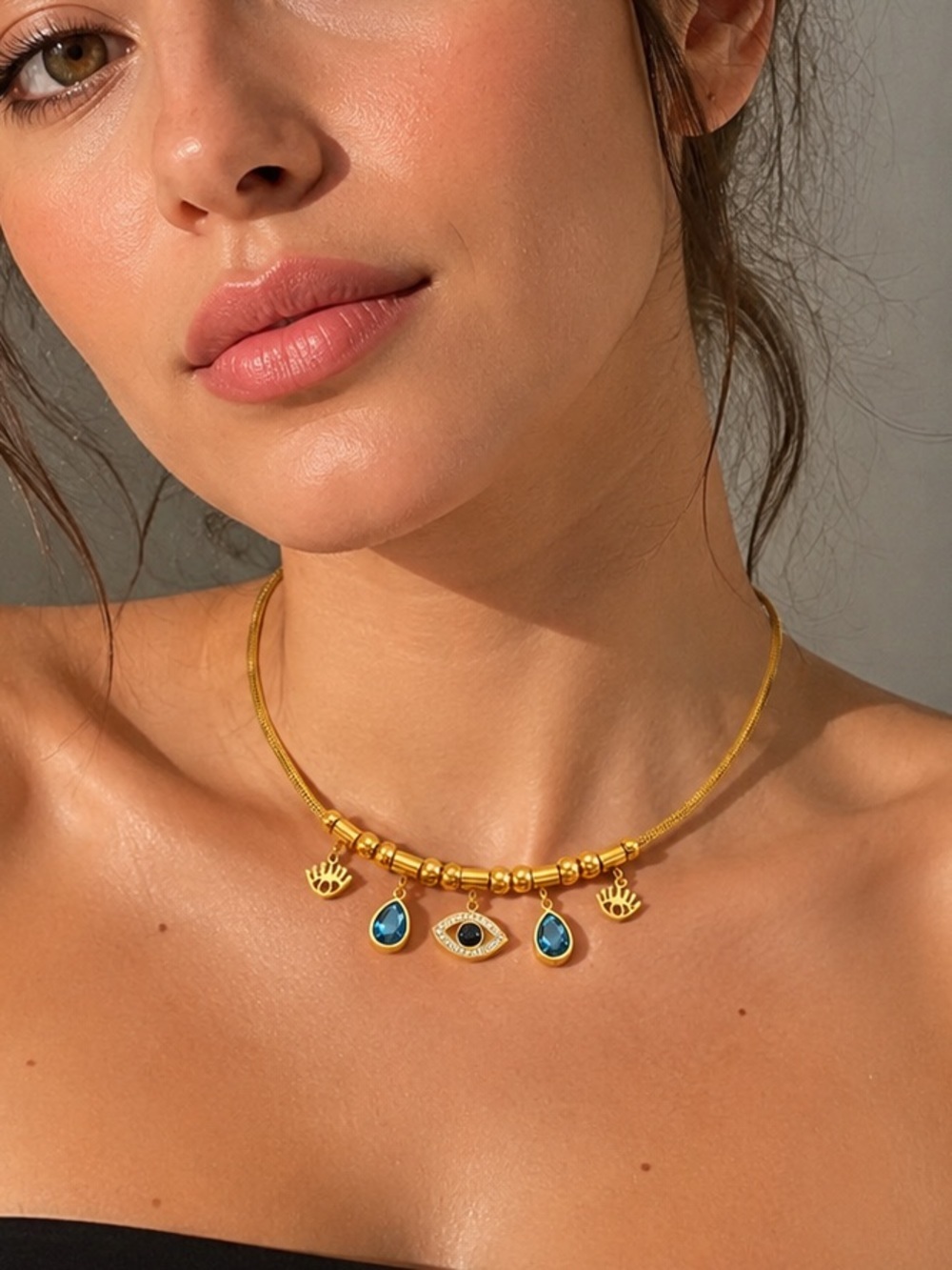 Gold multiple charm necklace